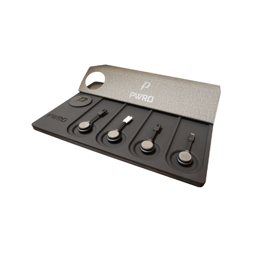 PWRD PRO multi-clipper and device charging mat with four charging stations, white background
